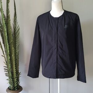 Nike women's black windbreaker with snap front